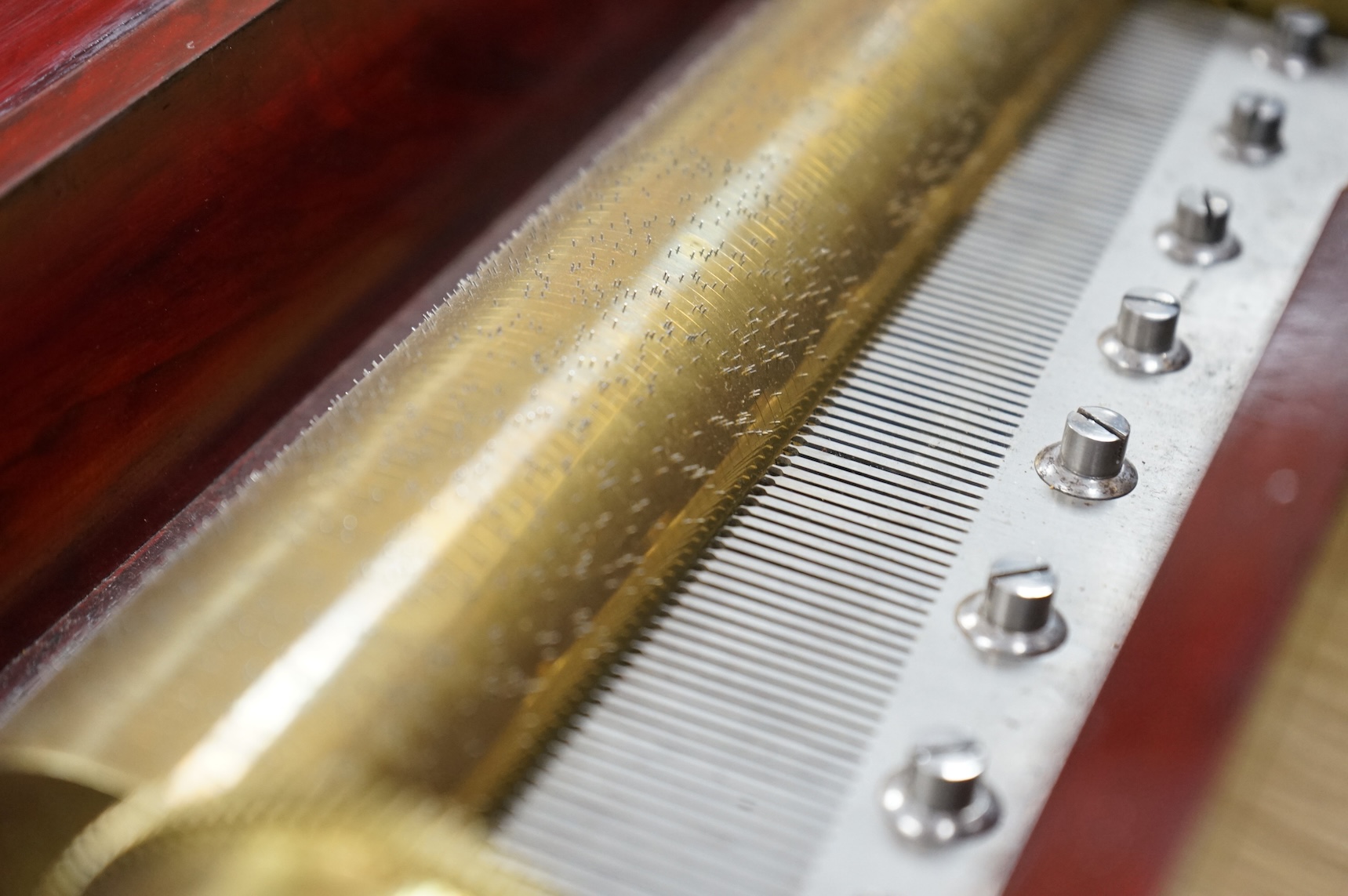 A mid 19th century Nicole Freres key wound cylinder musical box in an inlaid rosewood case, playing on approx 105 tooth comb, cylinder 27.5cm long, stamped ‘Nicole Frere a Geneve’, 26927, with key, the case; 45.5cm wide,